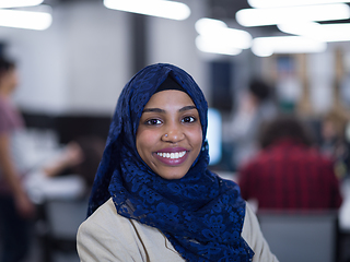 Image showing Portrait of black muslim female software developer