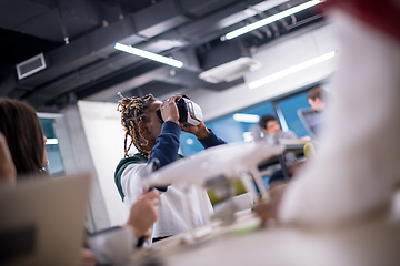 Image showing Young Multiethnic Business team using virtual reality headset