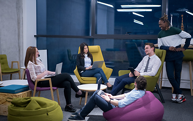 Image showing Multiethnic startup business team having meeting