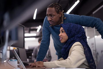 Image showing young black muslim female software developer at work