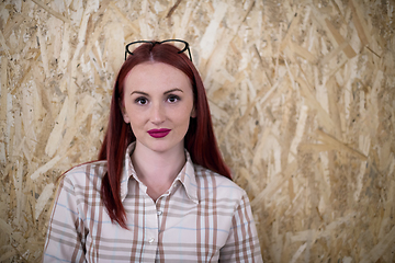 Image showing portrait of young redhead business woman