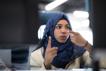 Image showing black muslim female software developer at work