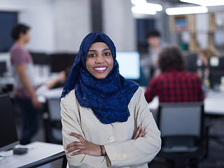 Image showing Portrait of black muslim female software developer
