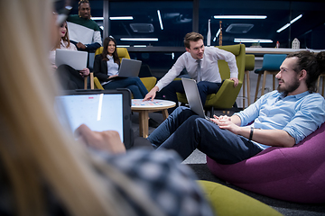 Image showing Multiethnic startup business team having meeting