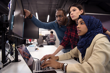 Image showing multiethnics team of software developers working together