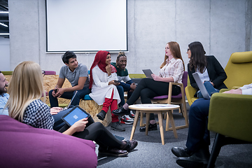 Image showing Multiethnic startup business team having meeting