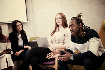 Image showing Multiethnic startup business team having meeting