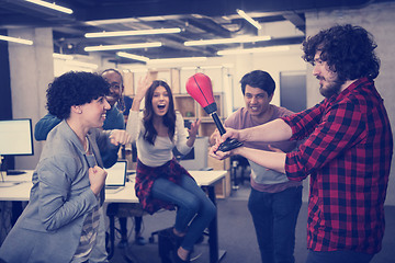 Image showing multiethnics business team boxing at office