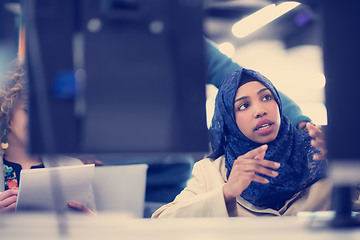 Image showing black muslim female software developer at work