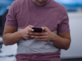 Image showing software developer using mobile phone