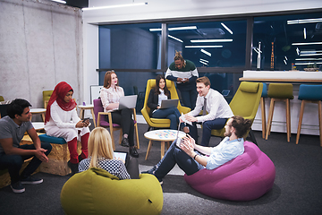 Image showing Multiethnic startup business team having meeting