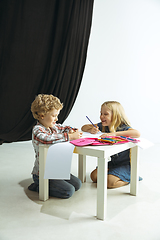 Image showing Boy and girl preparing for school after a long summer break. Back to school.