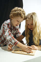 Image showing Boy and girl preparing for school after a long summer break. Back to school.