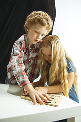 Image showing Boy and girl preparing for school after a long summer break. Back to school.