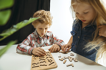 Image showing Boy and girl preparing for school after a long summer break. Back to school.