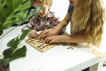 Image showing Boy and girl preparing for school after a long summer break. Back to school.