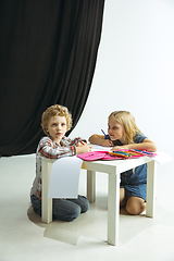 Image showing Boy and girl preparing for school after a long summer break. Back to school.