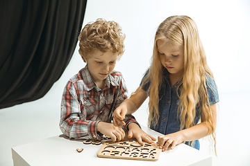 Image showing Boy and girl preparing for school after a long summer break. Back to school.