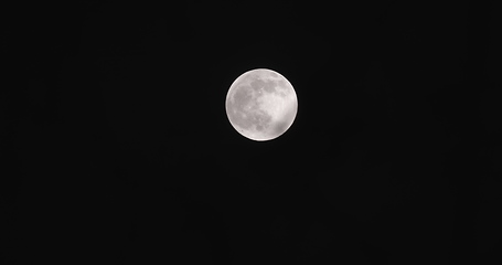 Image showing Full moon with clouds moving in front of it