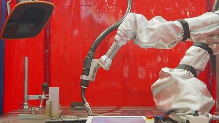 Image showing Automated robotic equipment at work