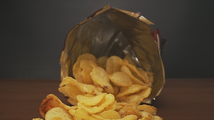 Image showing Potato chips in camera motion closeup footage