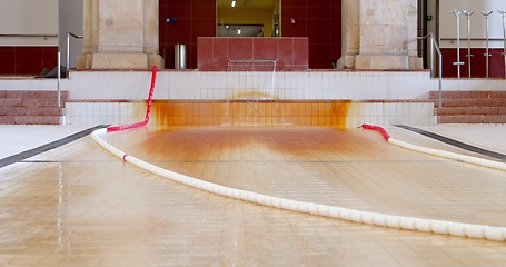 Image showing Empty pool with thermal water flowing through