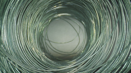 Image showing Camera motion in round steel wired tunnel