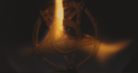 Image showing Amulet burning and mirror cracking in the fire 120fps slow motion footage