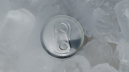 Image showing Aluminum Soda Tin Can Rotating in cool Ice motion footage