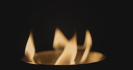 Image showing Fire dancing against dark background 120fps slow motion loopable footage