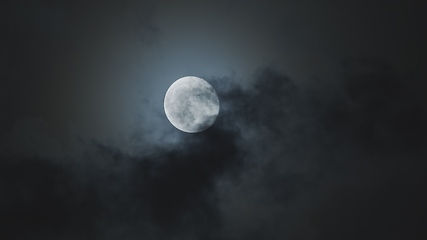 Image showing Full moon against cloudy night sky