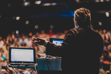 Image showing Public speaker giving talk at Business Event.