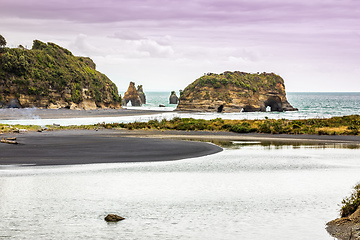 Image showing sea shore rocks and mount Taranaki, New Zealand