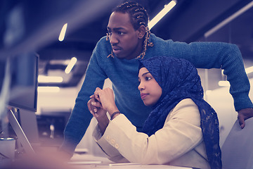 Image showing young black muslim female software developer at work