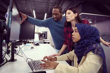 Image showing multiethnics team of software developers working together