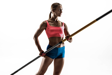 Image showing Female pole vaulter training on white studio background