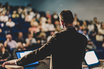 Image showing Public speaker giving talk at business event.