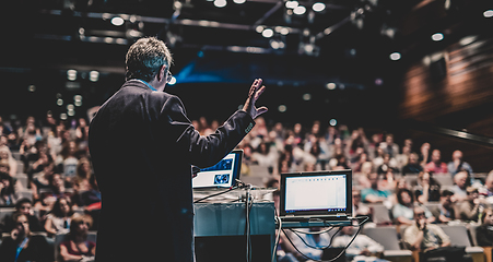 Image showing Public speaker giving talk at Business Event.