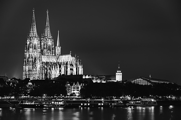 Image showing Cologne, Germany. View Of Cologne Cathedral. Catholic Gothic Cathedral In Night. UNESCO World Heritage Site. Black And White Colors