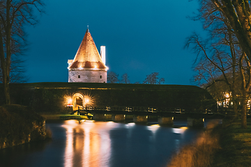 Image showing Kuressaare, Saaremaa Island, Estonia. Episcopal Castle In Evening Blue Hour Night. Traditional Medieval Architecture, Famous Attraction Landmark. Old Tower