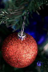 Image showing Christmas ornaments on tree.