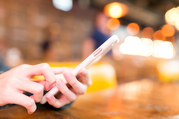 Image showing Woman using cellphone