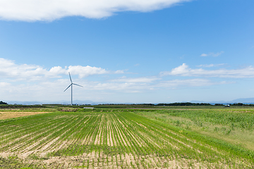 Image showing Wind turbine and field