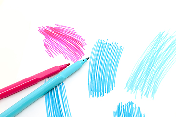 Image showing Two felt-tip pens on a white background with abstract drawings