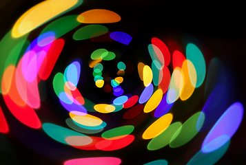 Image showing Bright unfocused colorful lights in night