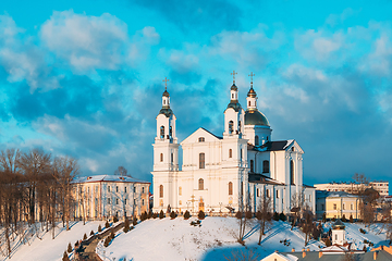 Image showing Vitebsk, Belarus. Famous Landmark Is Assumption Cathedral Church In Upper Town On Uspensky Mount Hill And Pushkin Bridge In Sunny Winter Day