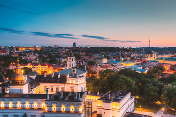 Image showing Vilnius, Lithuania, Eastern Europe. Aerial View Of Historic Center Cityscape In Blue Hour After Sunset. Travel View Of Old Town In Night Illuminations. UNESCO. Palace Of The Grand Dukes Of Lithuania.