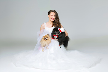 Image showing bride girl with Spitz dog wedding couple