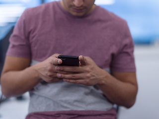 Image showing software developer using mobile phone