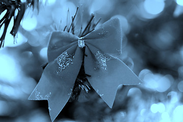 Image showing Christmas ornaments on tree.